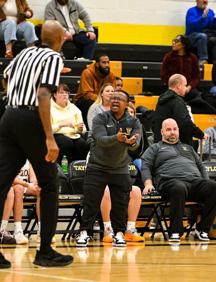 Coach Keith coaching at Taylor gym